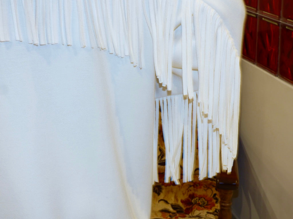 Gilet blanc à franges
