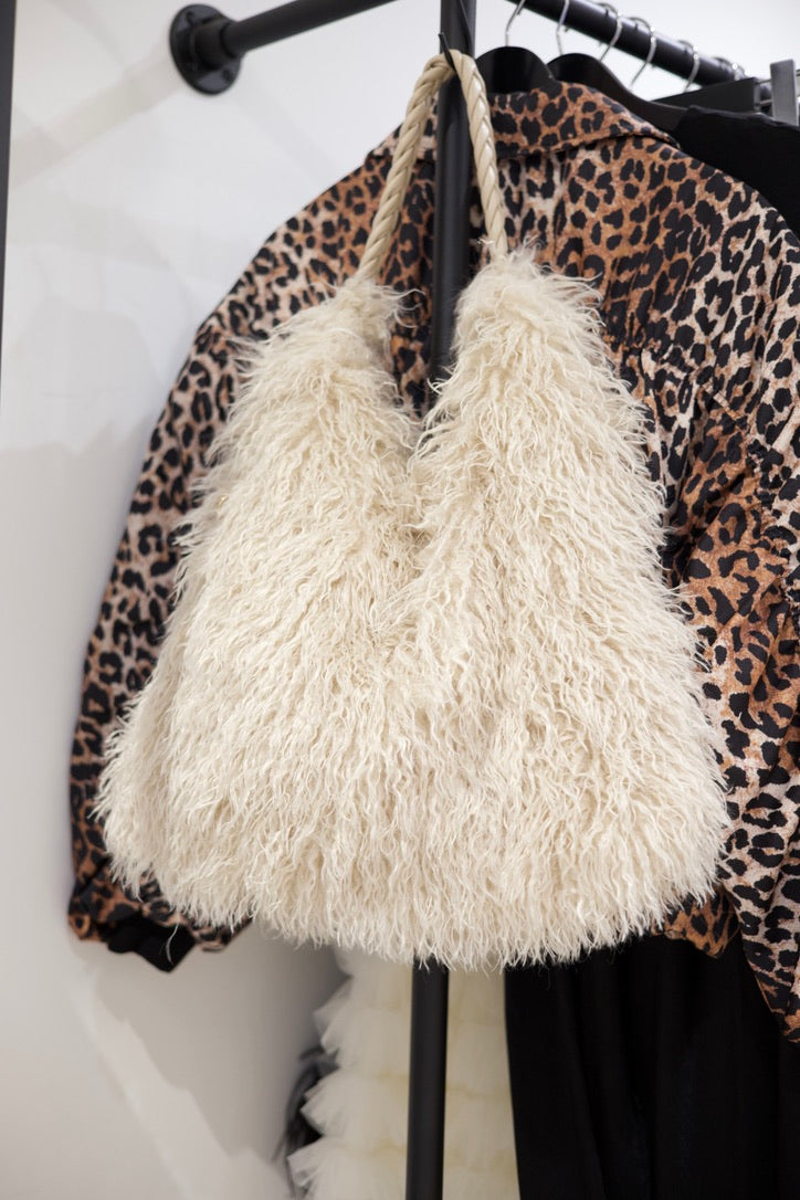 Sac fourré en mouton beige à poignées cordées