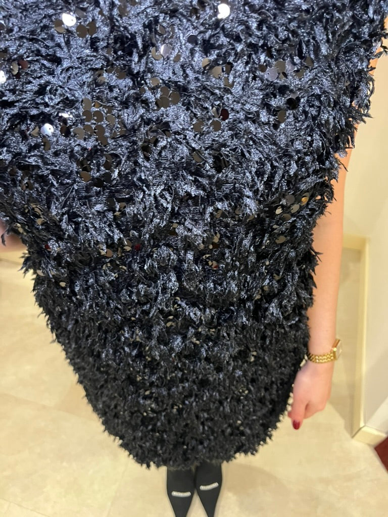 Robe à plumes et paillettes