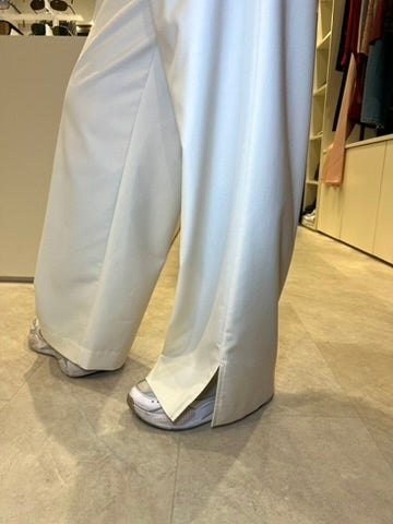 Pantalon à pinces structuré et élégant
